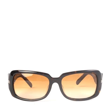 Tortoiseshell Burberry Glasses .